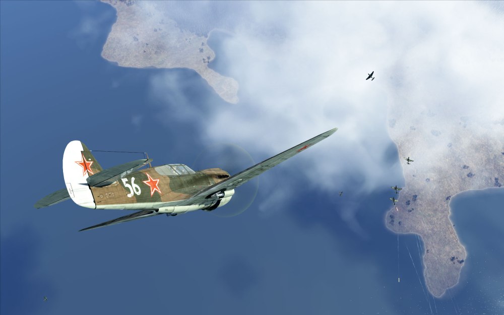 A P-40E drops down into an enemy formation